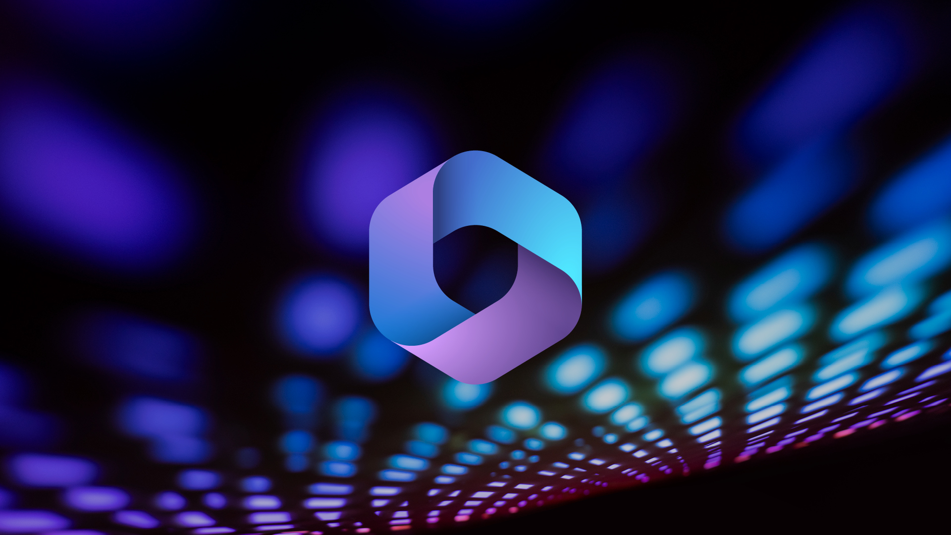 Microsoft Copilot Logo vor buntem, verschwommenem Lichtmuster