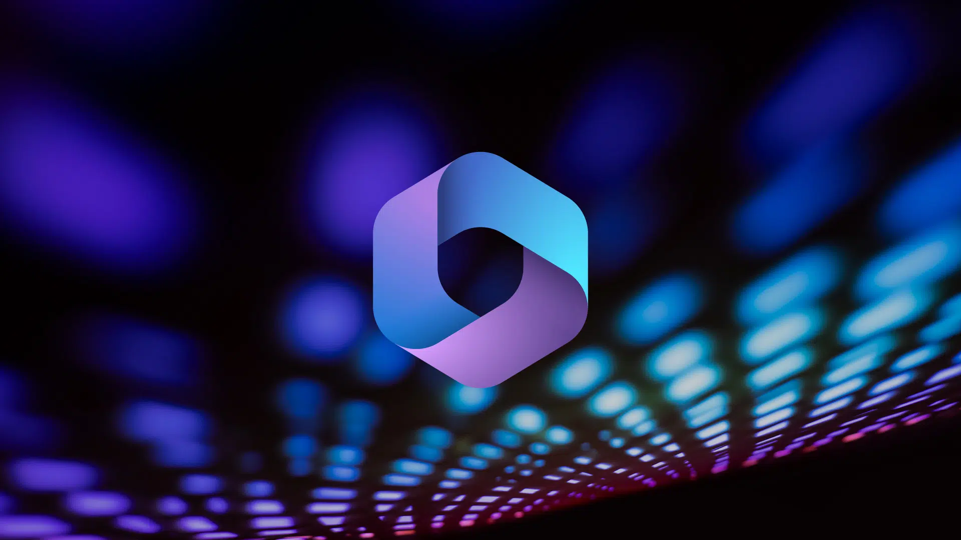 Microsoft Copilot Logo vor buntem, verschwommenem Lichtmuster