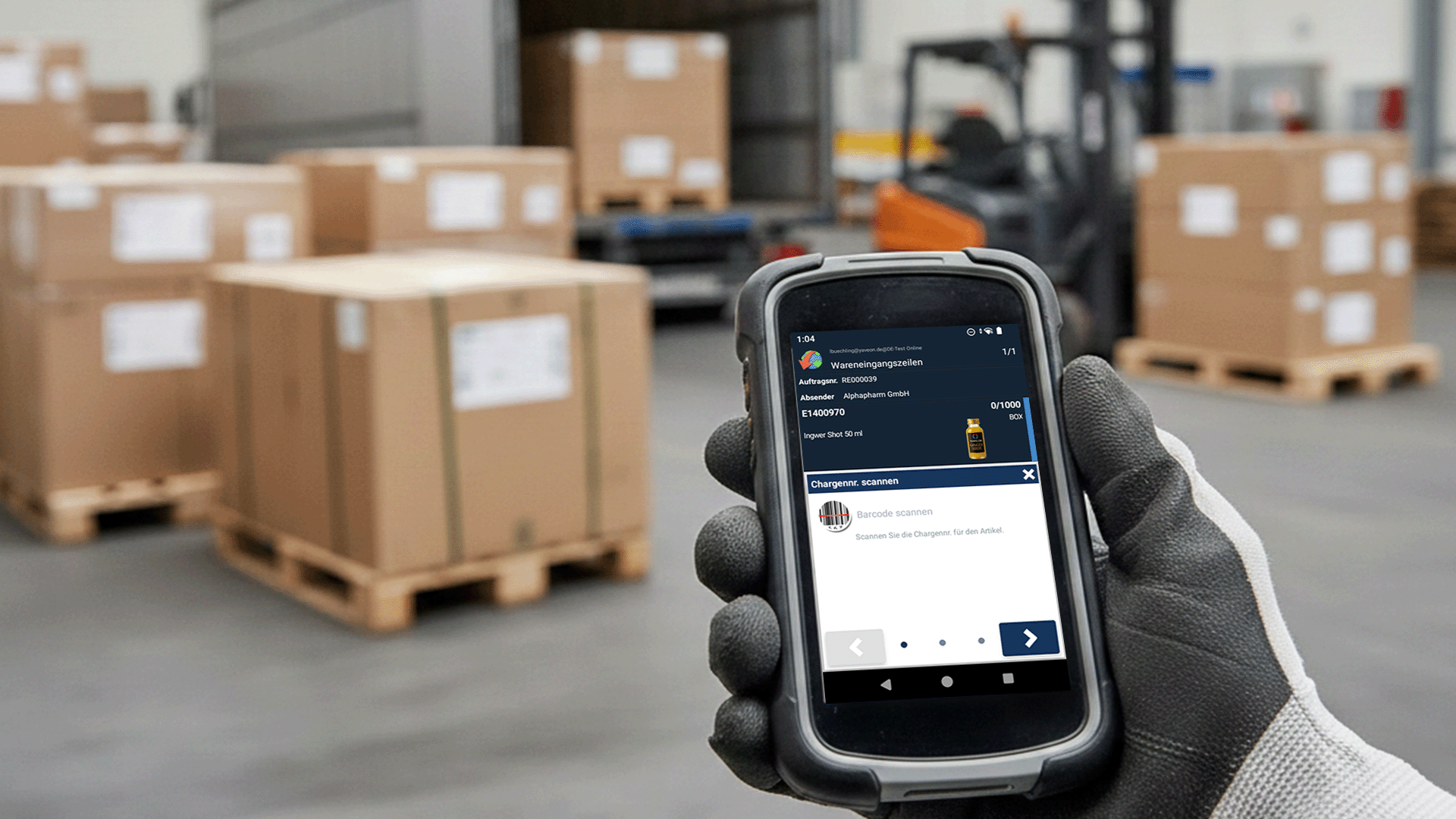 Scanner in warehouse checks goods with barcodes.